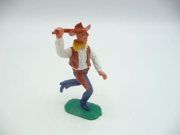 Timpo Toys Cowboy 2. Version laufend, Gewehr über dem Kopf