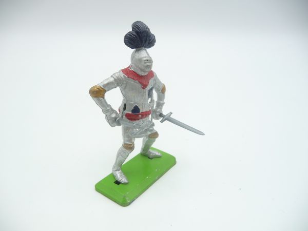 Britains Deetail Knight standing with battleaxe + sword in front of his body
