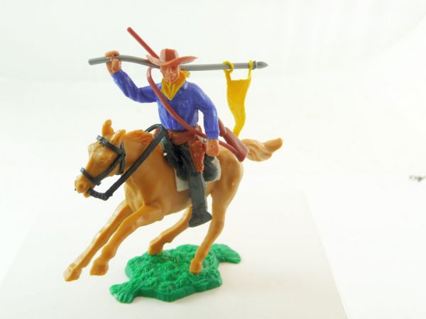 Timpo Toys Cowboy 2nd version riding, standard bearer with bear slayer