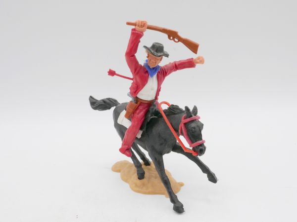 Timpo Toys Cowboy reitend, von Pfeil getroffen - tolle Farbkombi