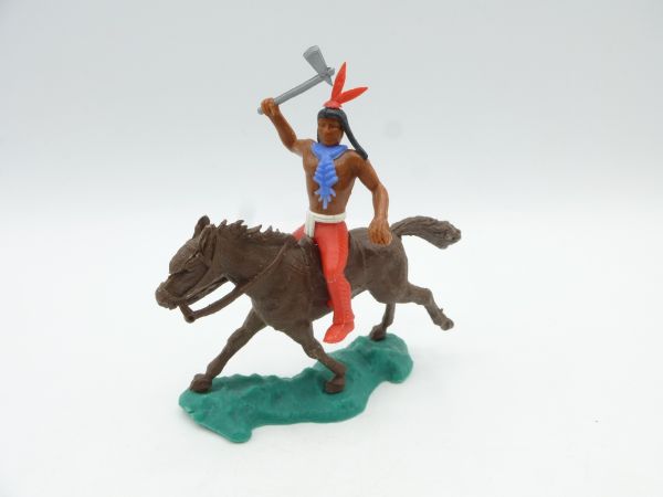 Crescent Indian riding with tomahawk