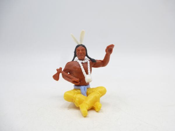 Timpo Toys Indianer 3. Version sitzend mit Tomahawk, grüßend