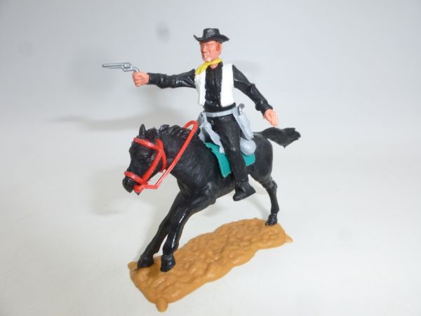 Timpo Toys Cowboy 3rd version (big head) riding, shooting pistol