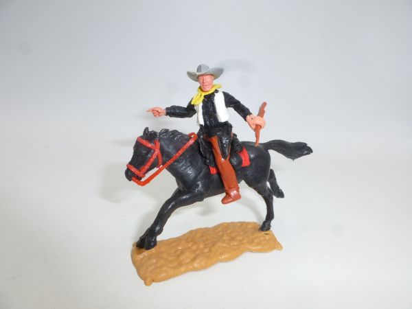 Timpo Toys Cowboy 2nd version riding, rifle sideways, pointing