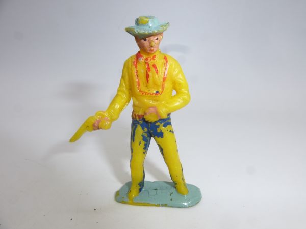 Timpo Toys Solid Cowboy pistol in right hand - age-appropriate condition