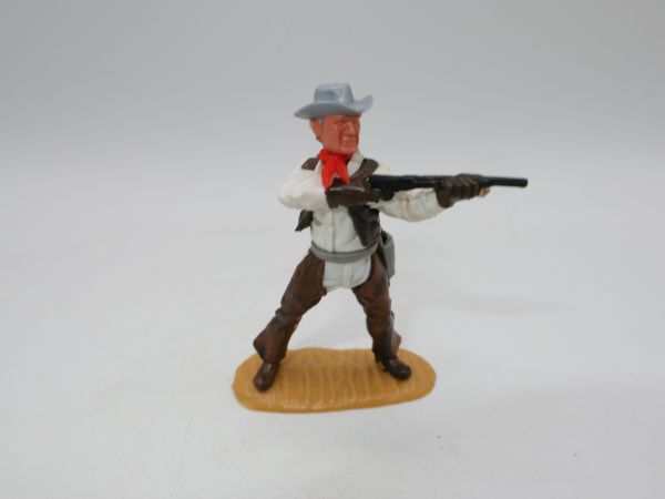 Timpo Toys Cowboy 4th version standing, shooting rifle, with chaps
