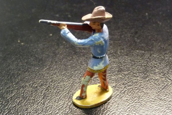 Merten Cowboy standing firing with rifle