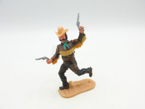 Timpo Toys Cowboy 4th version running with fringed shirt