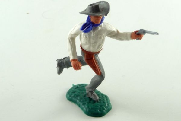 Timpo Toys Cowboy running with grey trousers and brown holster