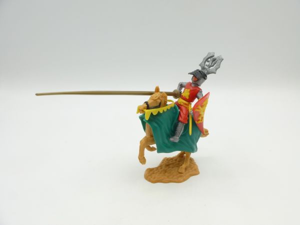 Timpo Toys Tournament knight riding red/yellow with golden lance