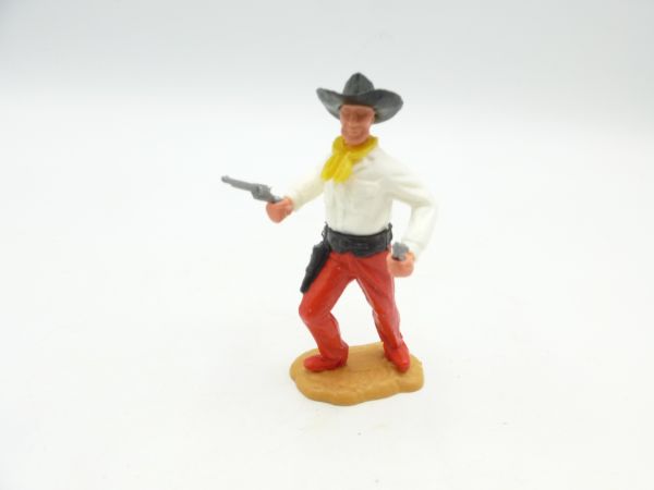 Timpo Toys Cowboy stehend mit 2 Pistolen - tolle Farbkombi