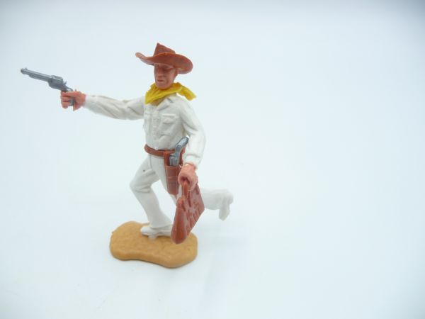Timpo Toys Cowboy 2. Version laufend mit Pistole + Geldtasche
