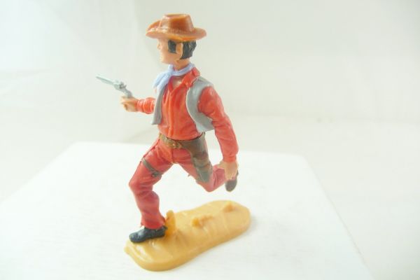 Timpo Toys Cowboy 4th version running, firing with pistol