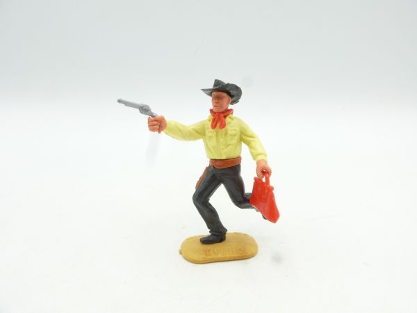 Timpo Toys Cowboy 2. Version laufend mit seltener roter Geldtasche