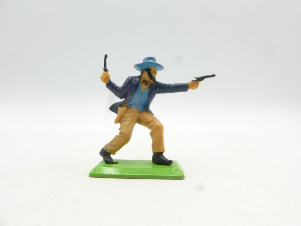 Britains Deetail Cowboy advancing, firing wild with 2 pistols, blue hat