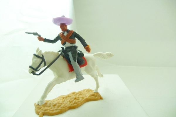 Timpo Toys Mexican riding, firing with pistol, black/white