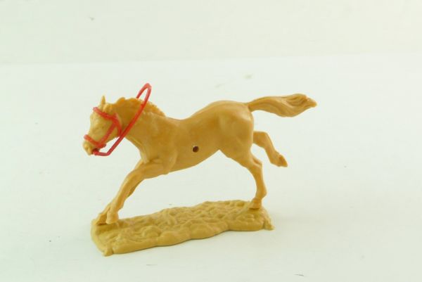 Timpo Toys Langlaufendes beiges Pferd mit rotem Zaumzeug