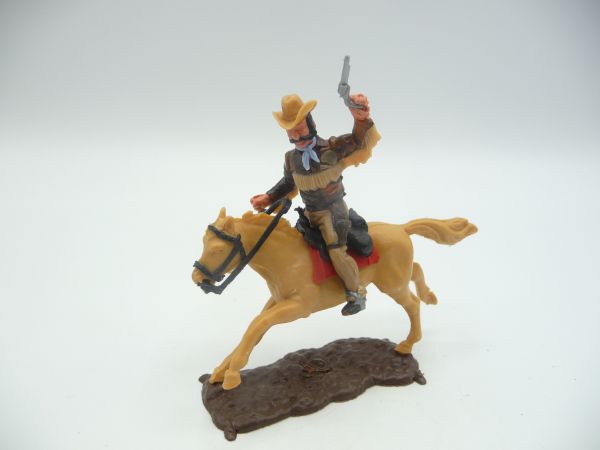 Timpo Toys Cowboy 4. Version reitend mit Pistole + Messer - tolle Bodenplatte