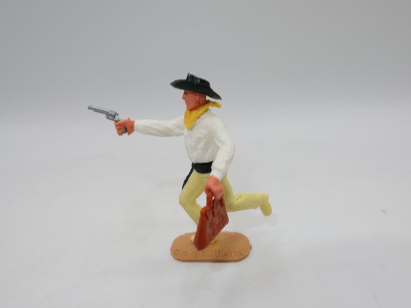 Timpo Toys Cowboy 2. Version laufend mit Geldtasche + Pistole