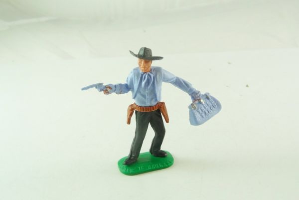 Timpo Toys Cowboy 1. Version hellblau mit Pistole und Geldtasche