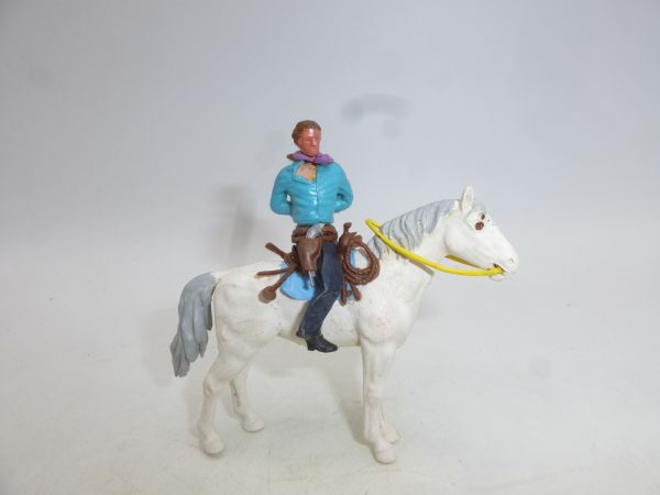 Britains Swoppets Cowboy riding with hands tied behind his back