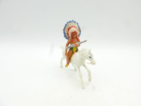 Jackson Indian riding, rifle in front of body - see photo