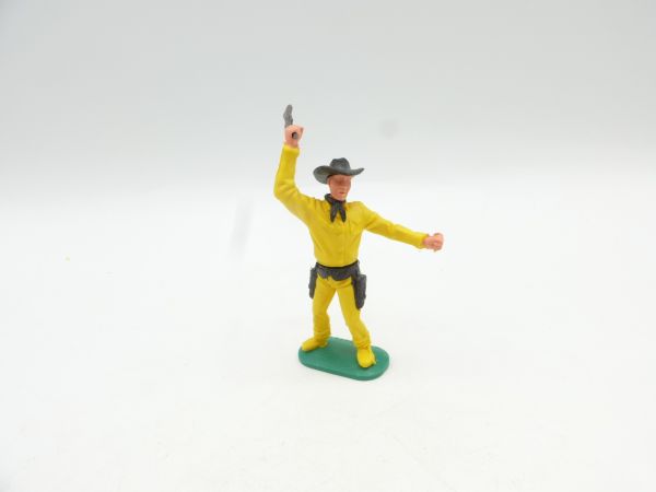 Timpo Toys Cowboy 2. Version stehend mit Gewehr schlagend